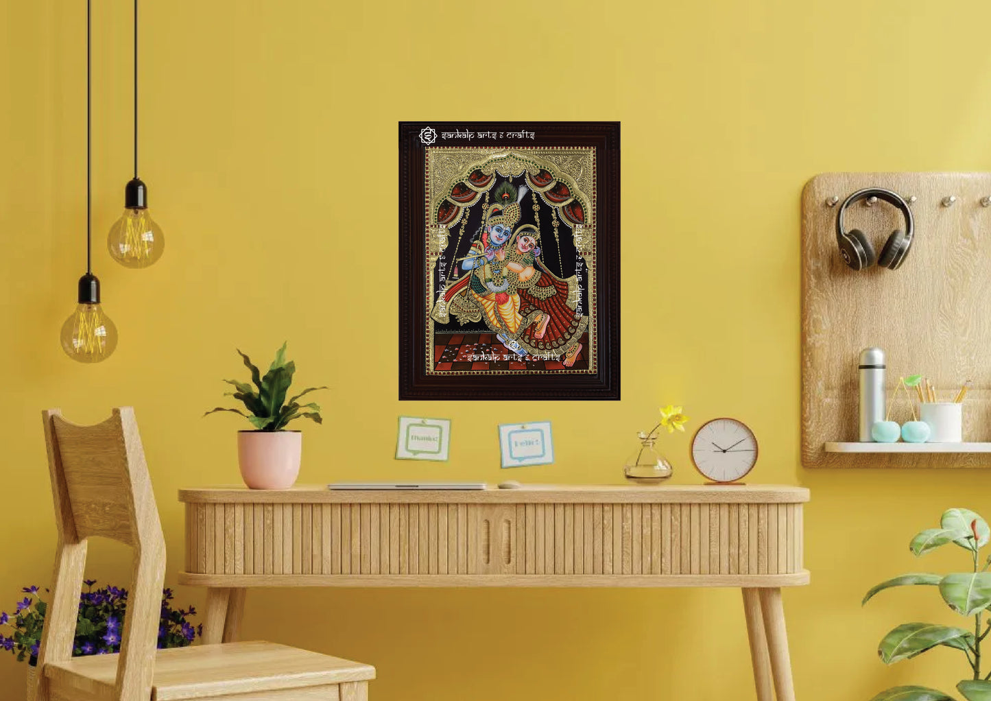 A divine Tanjore painting of Radha and Krishna seated on a beautifully decorated Jhula, bringing grace to home decor. Available in Chennai & Bangalore.