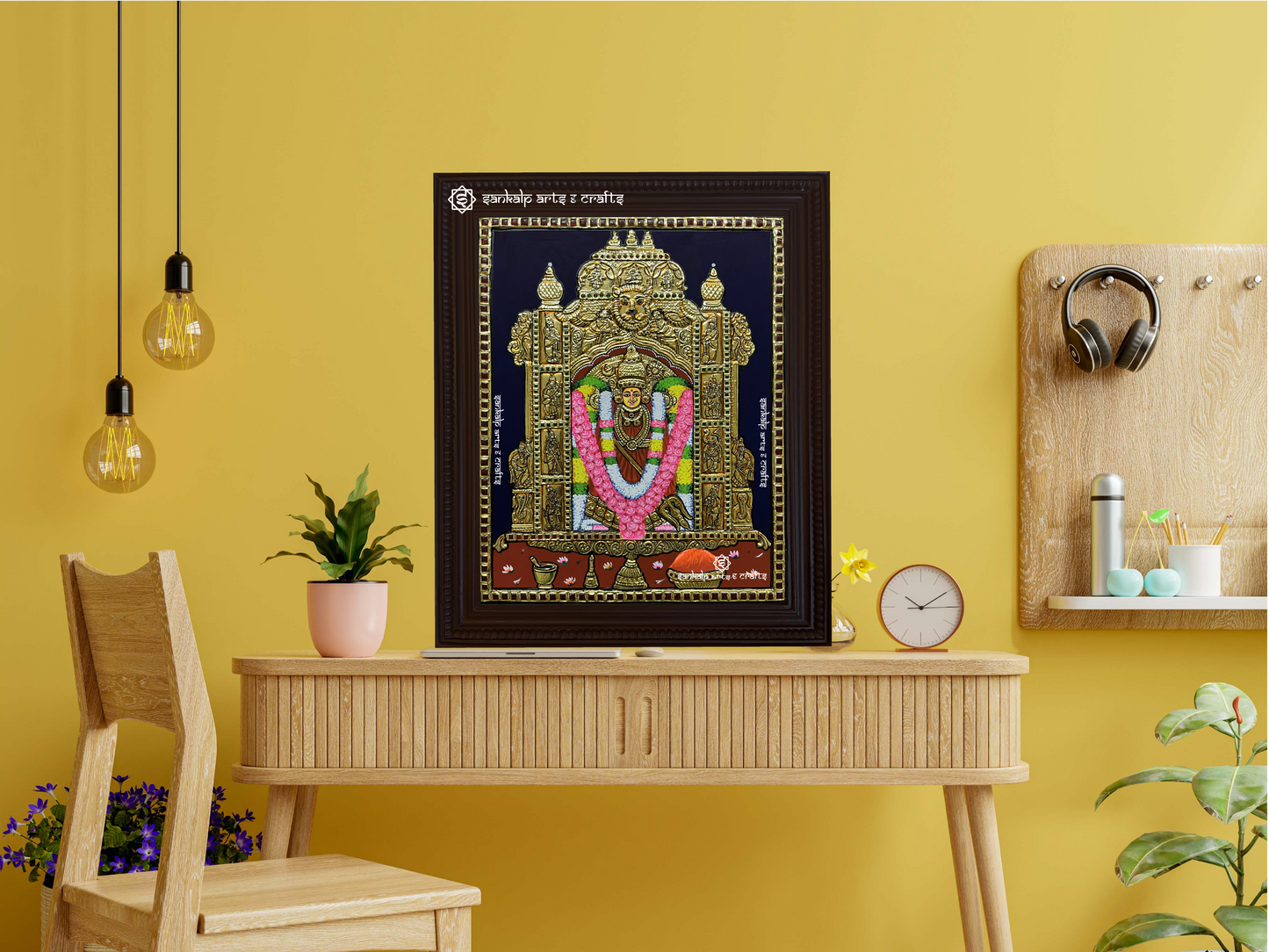 A framed Kanaga Durga Tanjore painting displayed as a wall hanging, radiating divine energy with its intricate gold work and vibrant depiction of the goddess.