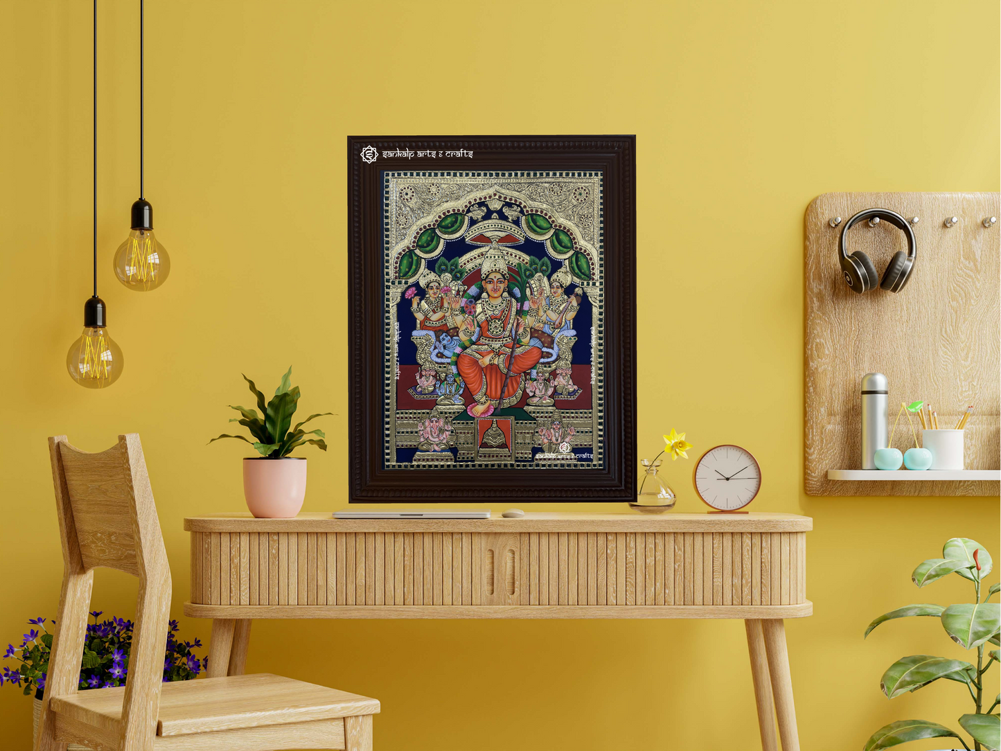 A framed Lalitha Parameshwari Tanjore painting displayed as a wall hanging, enhancing the space with its intricate details, spiritual energy, and traditional gold work.