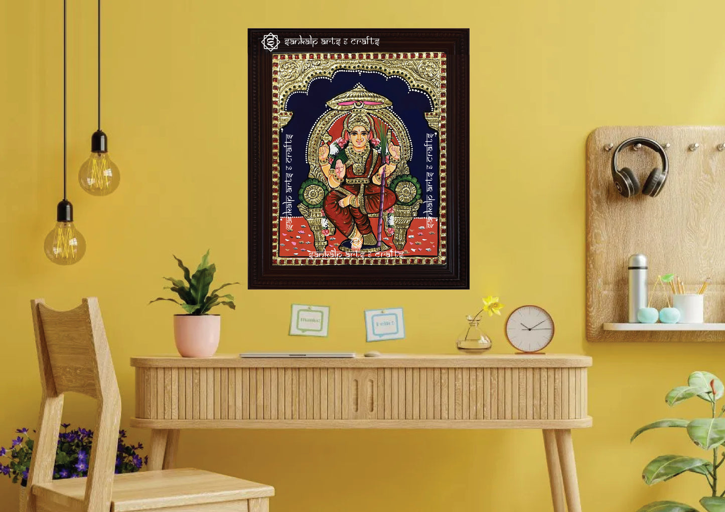 A framed Lalithambigai Tanjore painting in Chennai & Bangalore, featuring the goddess seated in divine glory, enriched with gold foil detailing and vibrant shades, an ideal addition to pooja rooms and spiritual spaces for positivity and devotion.