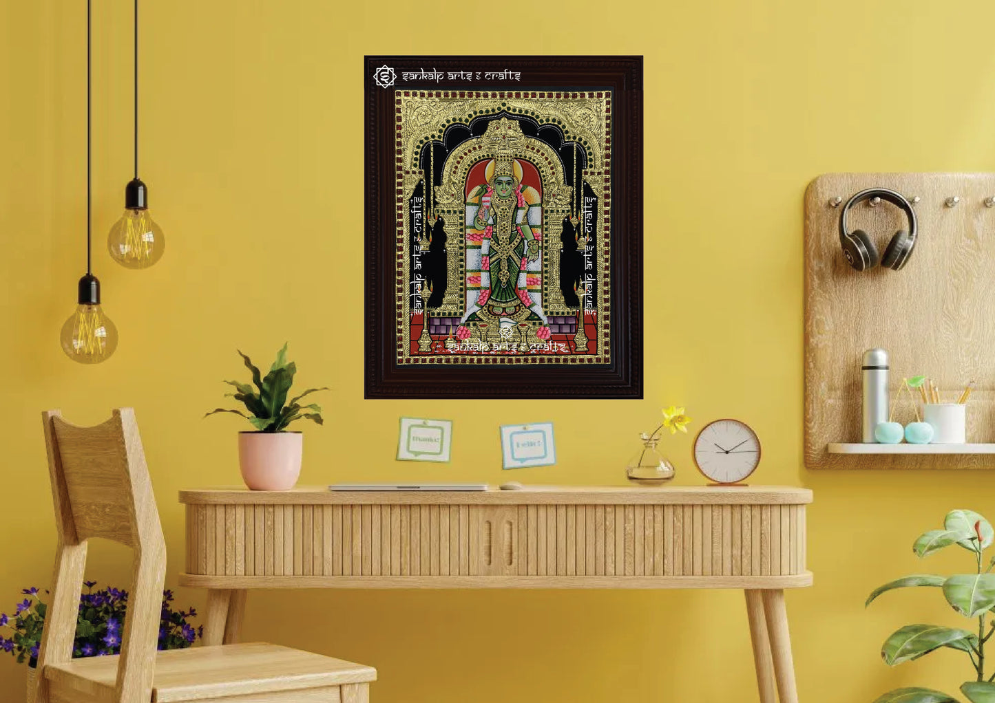 An elegant Meenakshi Amman Tanjore painting, beautifully framed for wall hanging. Enhances spiritual ambiance in homes across Chennai & Bangalore.