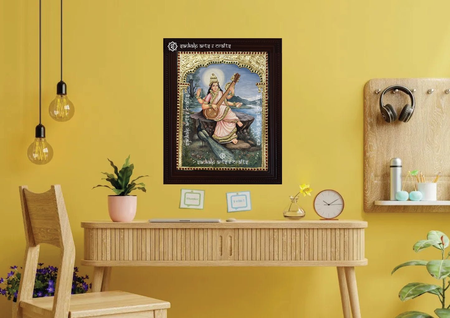 A framed Saraswathi Tanjore painting inspired by Raja Ravi Varma, with rich gold accents. This spiritual artwork enhances any space and is available in Chennai & Bangalore.