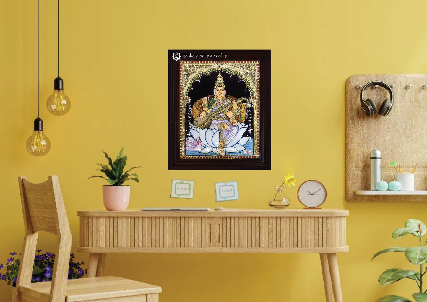 A beautifully framed Saraswathi Tanjore painting, exuding divine grace. A perfect wall hanging decor piece for Chennai & Bangalore homes.