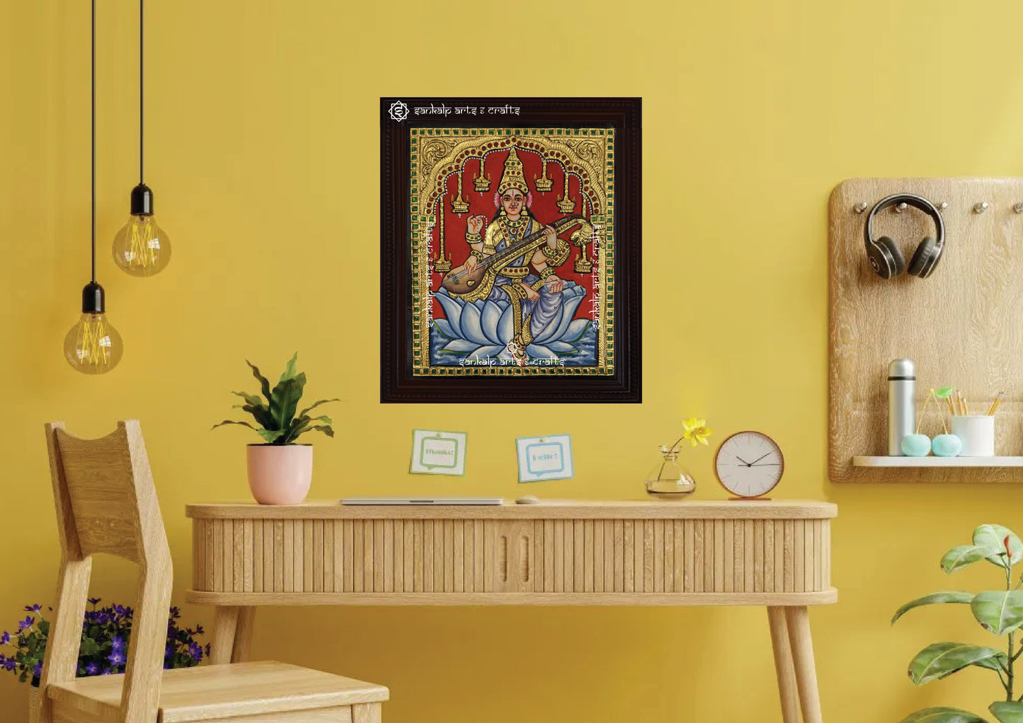 An elegantly framed Saraswathi Tanjore painting in antique style, ideal for pooja rooms and traditional decor, available in Chennai & Bangalore.