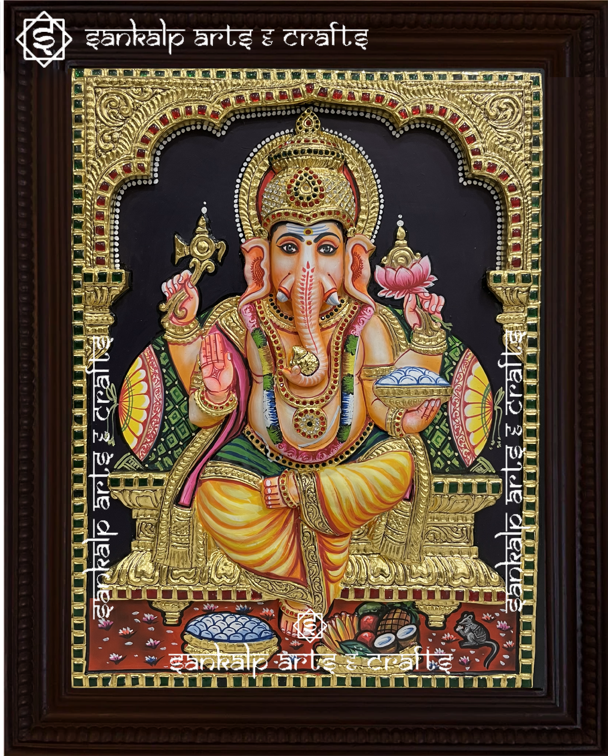 A beautifully framed 3D Tanjore painting of Lord Ganesha, designed with intricate gold foil detailing. A perfect decor piece for homes in Chennai & Bangalore.