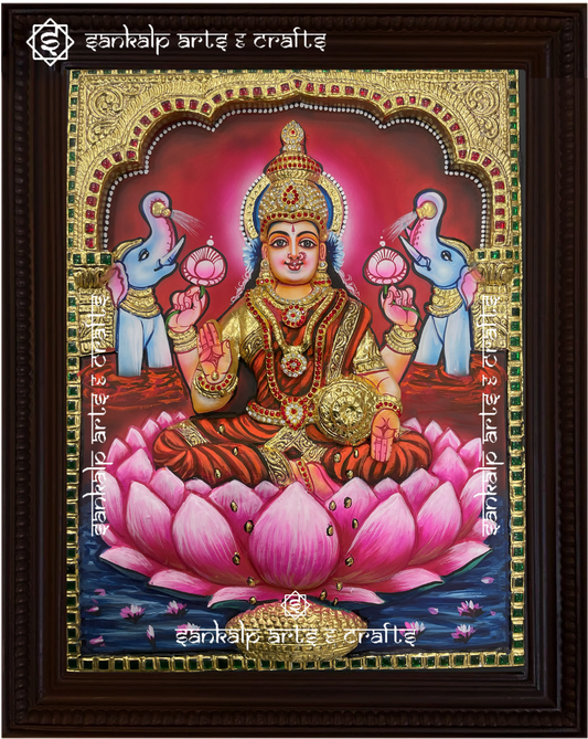 A beautifully framed 3D Tanjore painting of Goddess Mahalakshmi, adorned with intricate gold detailing. A perfect decor piece for homes in Chennai & Bangalore.