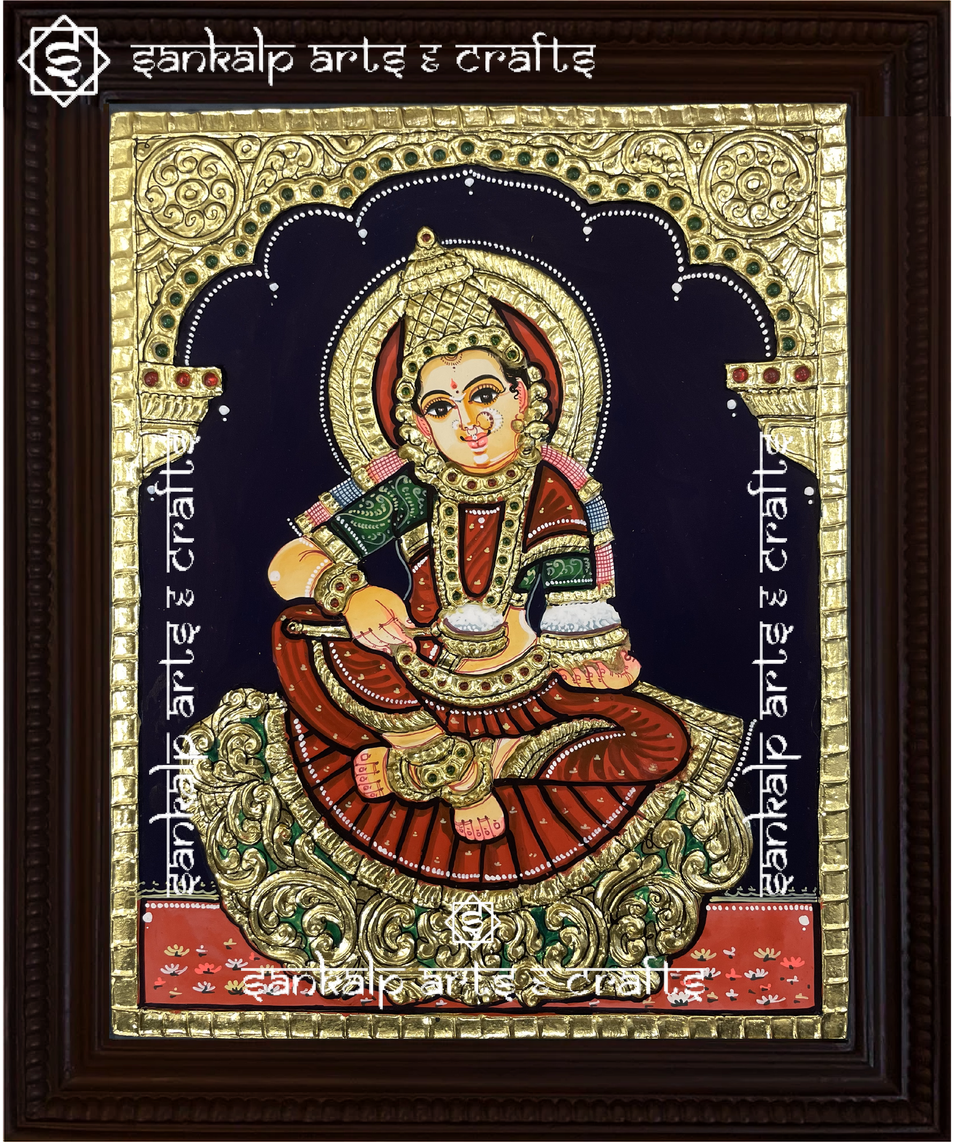 A close-up of the Annapoorni Tanjore painting, showcasing the goddess’s serene expression, detailed gold embellishments, and traditional South Indian artistic style.

