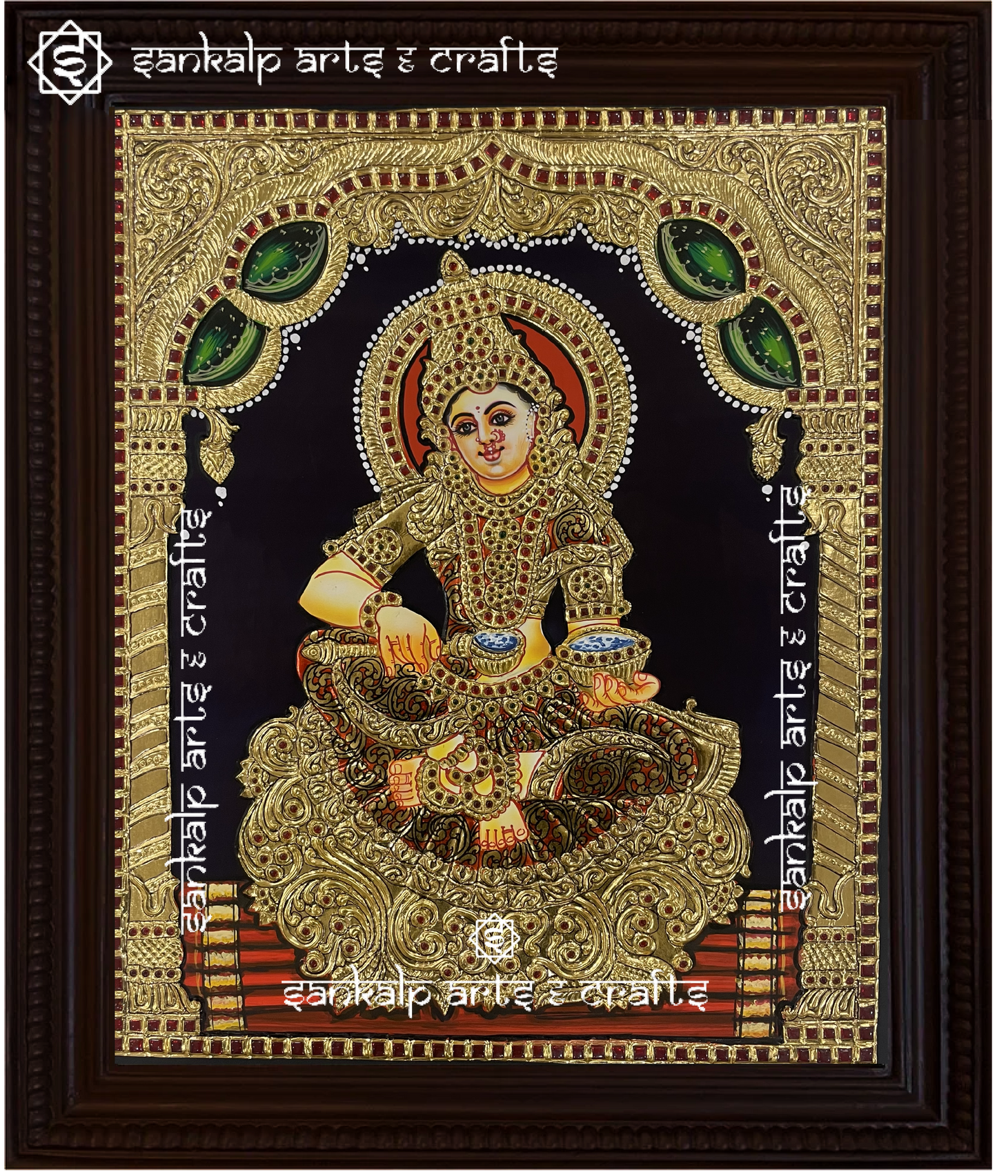 A close-up of the Annapoorni Tanjore painting, showcasing the goddess’s serene expression, rich gold embellishments, and classic South Indian artistic craftsmanship.

