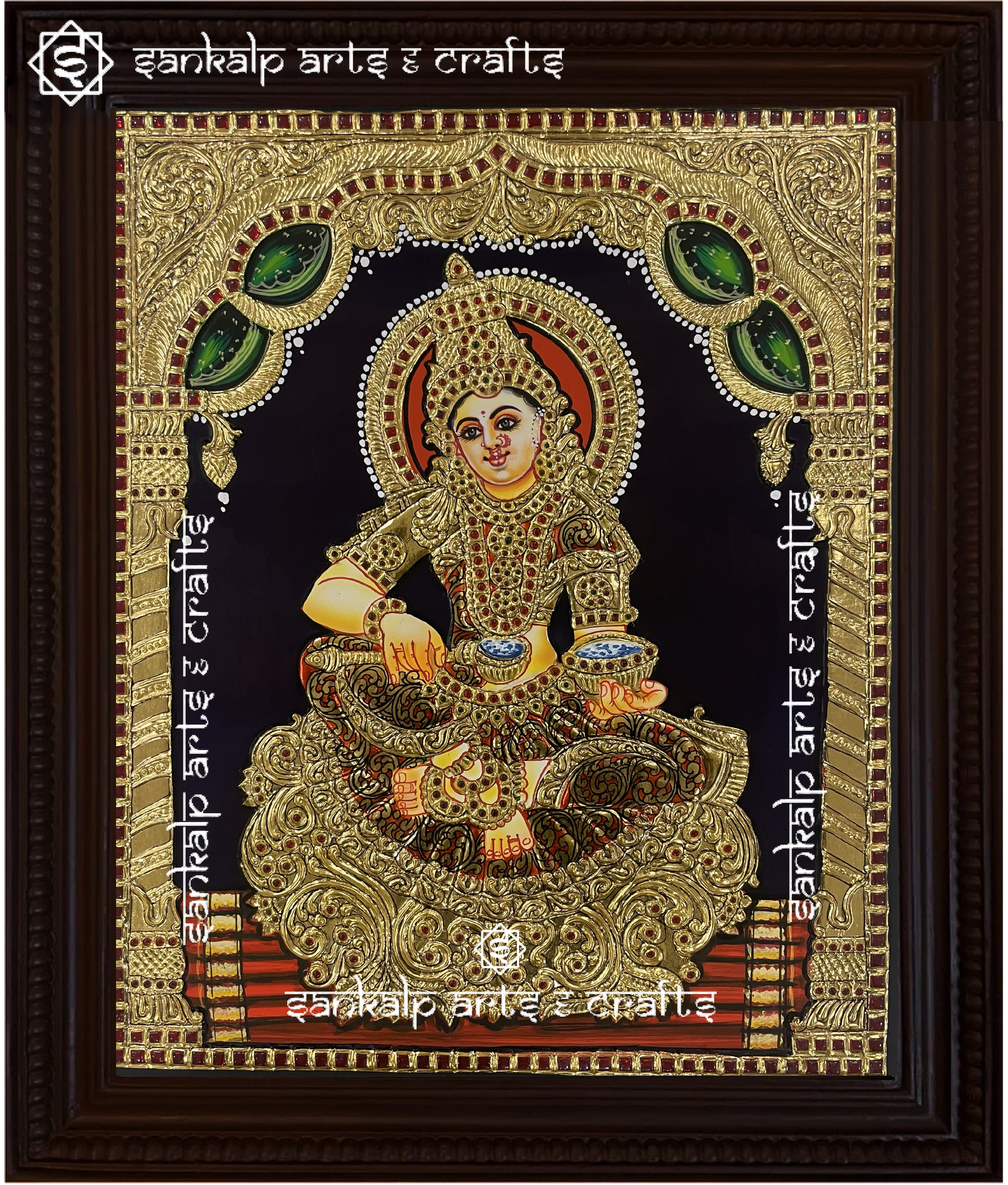 A close-up of the Annapoorni Tanjore painting, showcasing the goddess’s serene expression, rich gold embellishments, and classic South Indian artistic craftsmanship.

