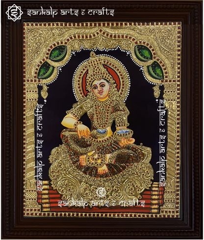 A close-up of the Annapoorni Tanjore painting, showcasing the goddess’s serene expression, rich gold embellishments, and classic South Indian artistic craftsmanship.

