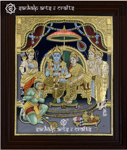 A beautifully framed antique-style Tanjore painting of Ram Darbar, featuring Lord Rama, Sita, Lakshmana, and Hanuman with rich gold detailing. A perfect decor piece for homes in Chennai & Bangalore.