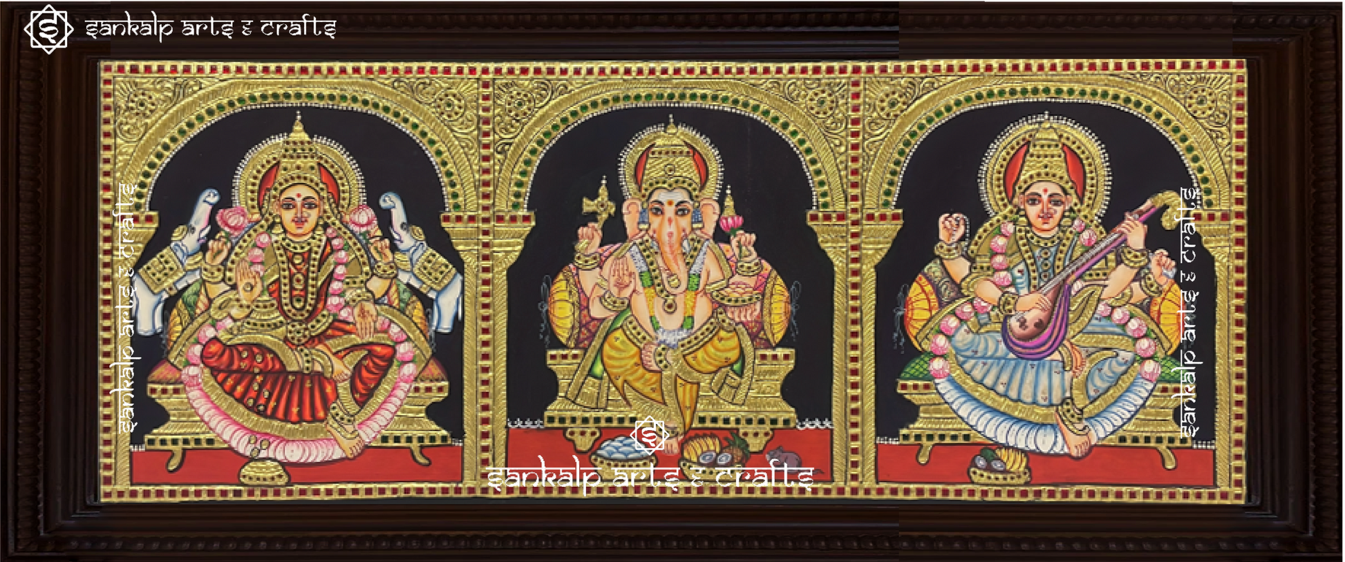 A beautifully handcrafted antique-style Tanjore painting featuring Lord Ganesha, Goddess Lakshmi, and Goddess Saraswathi in a single panel, adorned with intricate gold foil detailing and rich traditional colors, perfect for pooja rooms.

