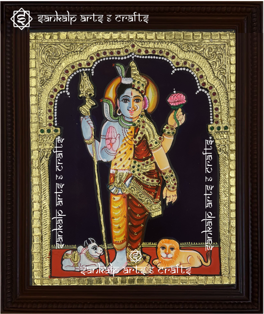 A beautifully handcrafted Arthanareeswarar Tanjore painting depicting the divine union of Lord Shiva and Goddess Parvathi, symbolizing balance and harmony. The intricate gold foil detailing and vibrant colors enhance the spiritual energy of this sacred artwork.

