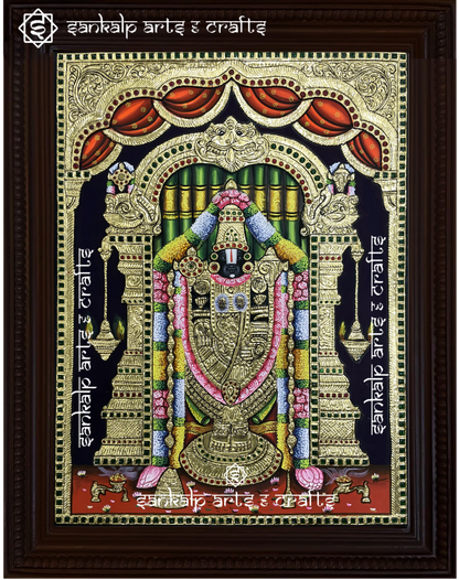 A beautifully handcrafted Balaji Tanjore painting depicting Lord Venkateswara, seated on a majestic throne, adorned with intricate gold foil detailing and vibrant colors, symbolizing divine blessings, prosperity, and spiritual protection.

