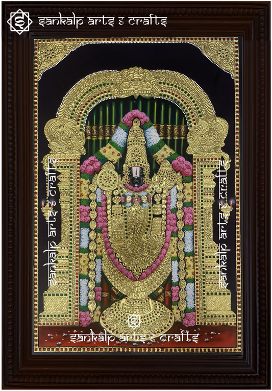 A beautifully framed Tanjore painting of Lord Balaji, featuring intricate gold detailing and vibrant colors. A perfect decor piece for homes in Chennai & Bangalore.