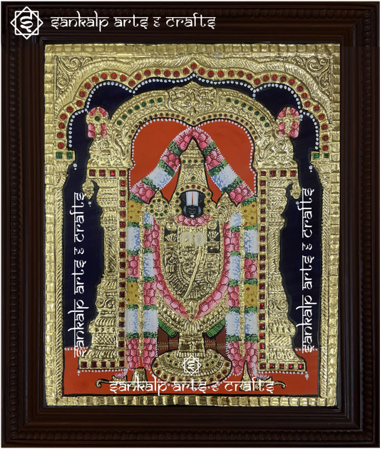 A beautifully framed Tanjore painting of Lord Balaji, crafted with intricate gold foil work and rich colors. A perfect decor piece for homes in Chennai & Bangalore.

