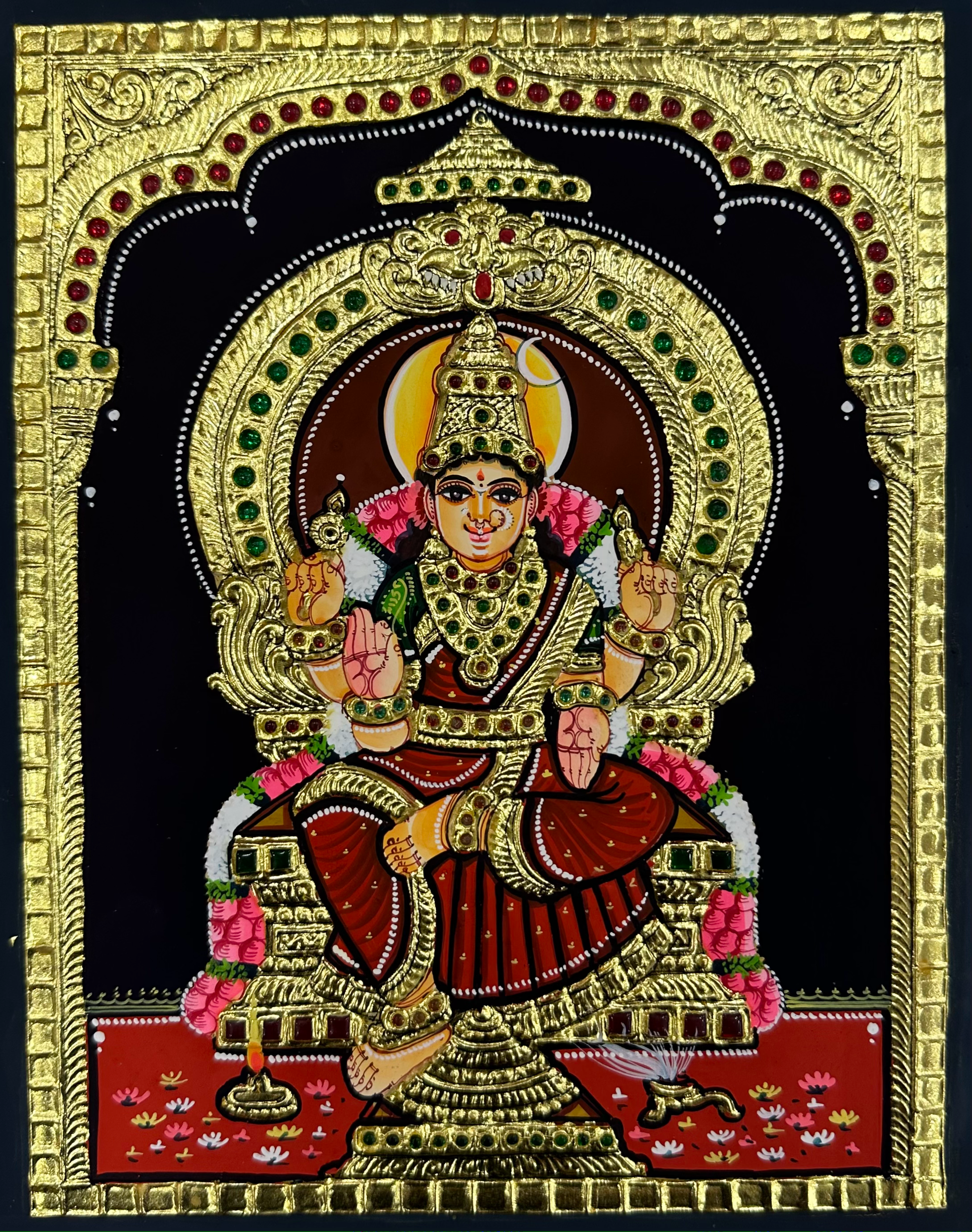 Close-up of the Bhuvaneshwari Tanjore painting, highlighting the intricate gold details and the divine portrayal of the goddess, perfect for adding a sacred touch to any room.
