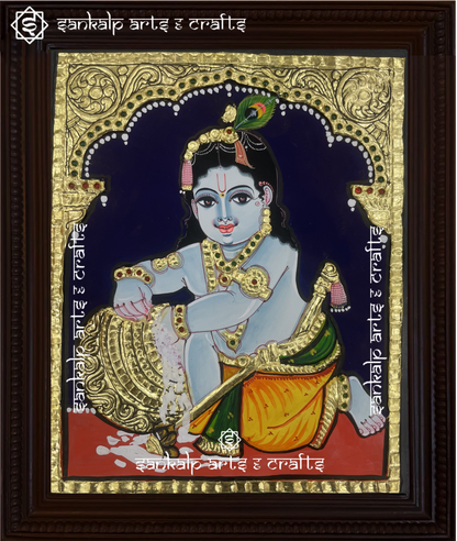This traditional Butter Krishna Tanjore painting adds a spiritual touch to decor, bringing divine charm to homes in Chennai & Bangalore.

