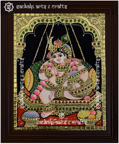 A handcrafted Butter Krishna Tanjore painting, adorned with rich gold foil and intricate details, framed to enhance divine decor in Chennai & Bangalore.