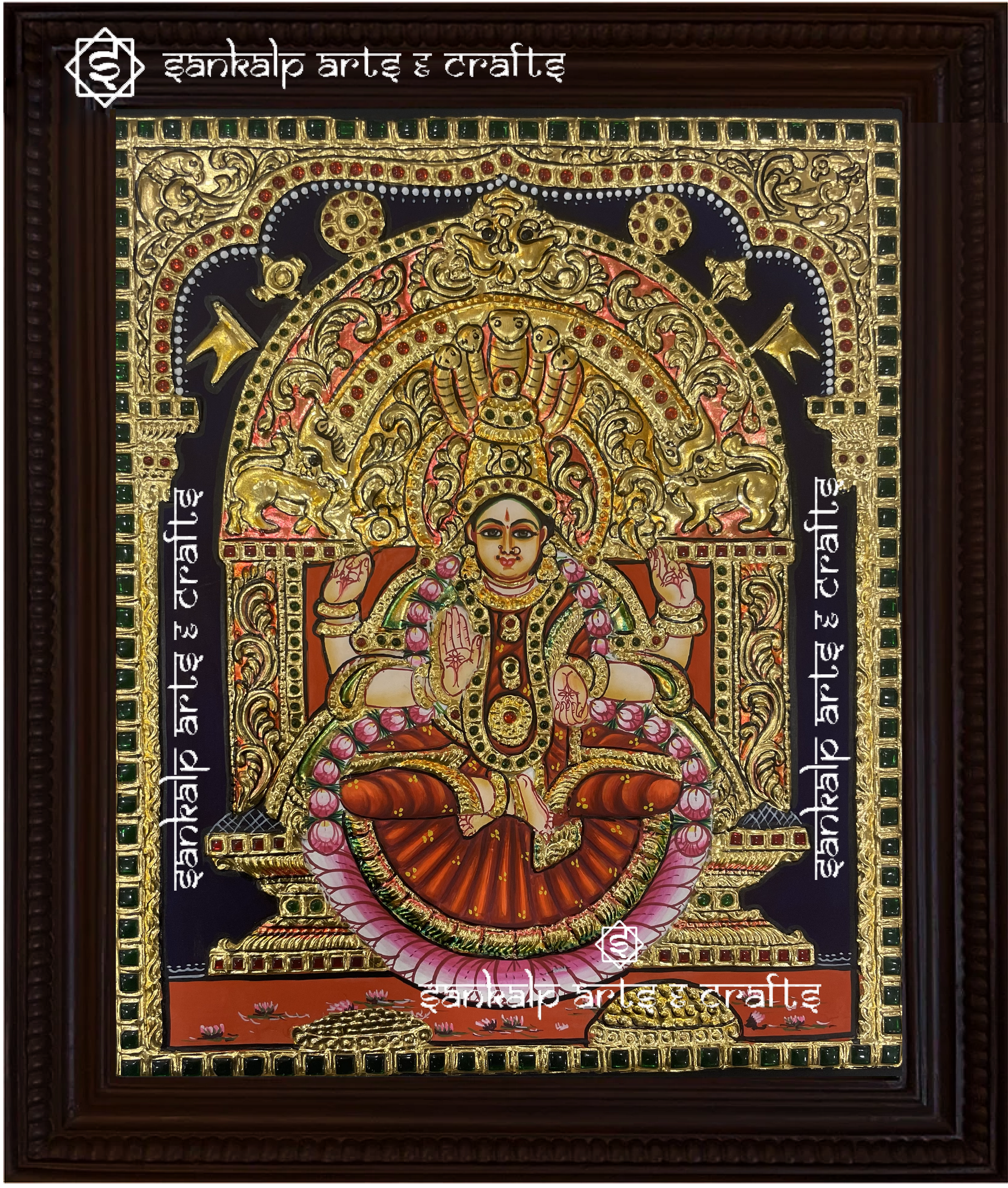 A beautifully framed Tanjore painting of Goddess Devi, adorned with intricate gold foil and rich colors. A perfect decor piece for homes in Chennai & Bangalore.