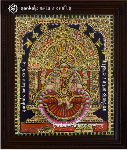 A beautifully framed Tanjore painting of Goddess Devi, adorned with intricate gold foil and rich colors. A perfect decor piece for homes in Chennai & Bangalore.