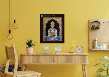 A framed Dhanvantari Tanjore painting, radiating divine healing energy with intricate gold work and vibrant hues, perfect for bringing wellness, prosperity, and spiritual protection to your pooja room or living space.

