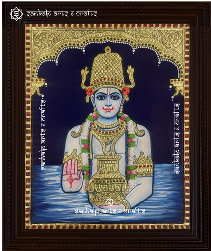 A sacred framed Tanjore painting of Lord Dhanvantri, the god of Ayurveda, adorned with rich gold foil detailing. A perfect spiritual decor piece for homes in Chennai & Bangalore.

