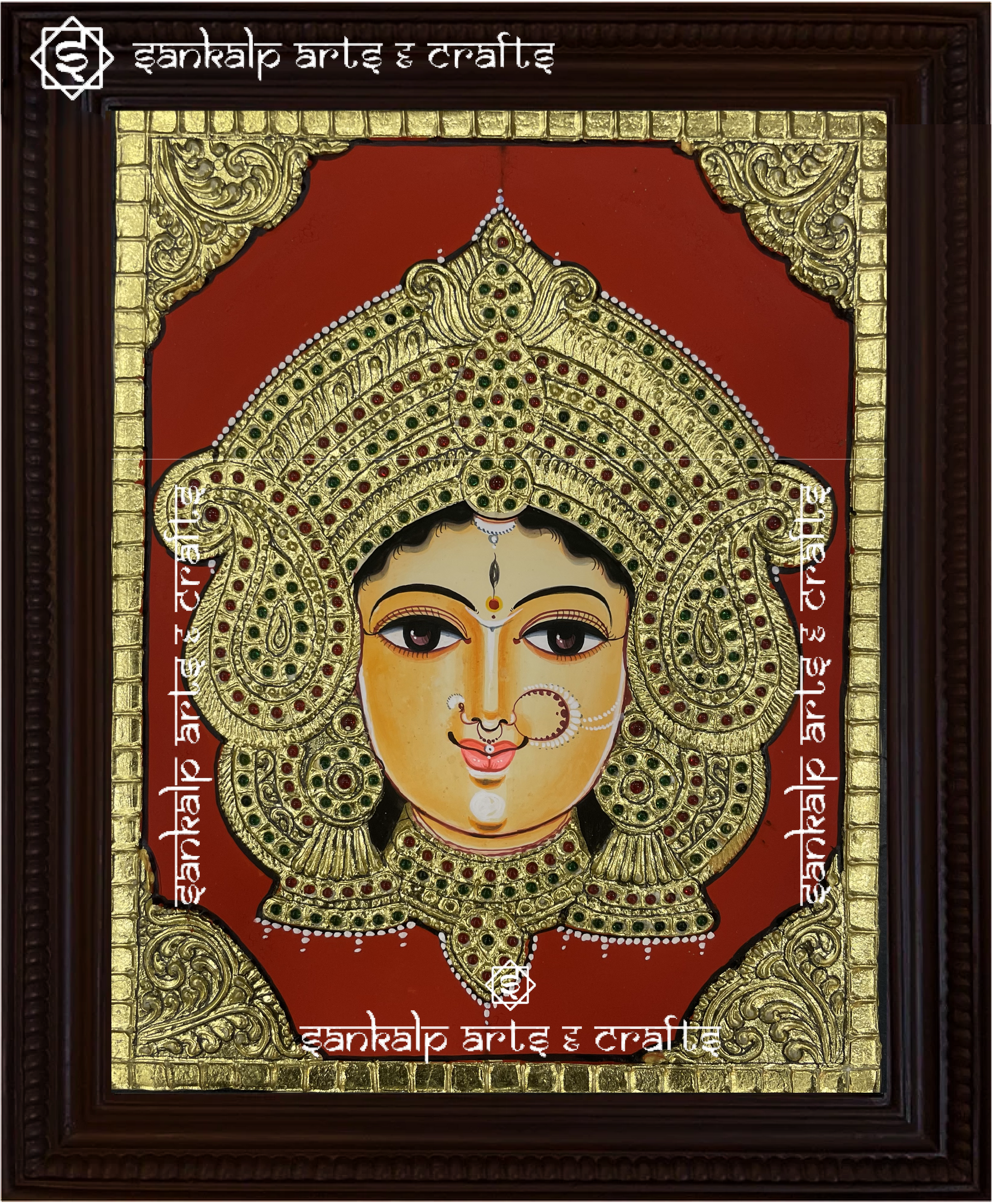 A close-up of the Durga Devi Tanjore painting showcasing Goddess Durga with her weapons, beautifully embellished with gold leaf and rich colors, radiating strength, protection, and spiritual power.

