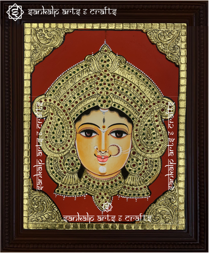 A beautifully handcrafted Durga Devi Tanjore painting depicting Goddess Durga in her powerful and protective form, adorned with intricate gold foil detailing and vibrant colors, capturing her divine energy and strength.