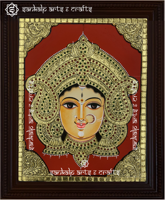 A beautifully handcrafted Durga Devi Tanjore painting depicting Goddess Durga in her powerful and protective form, adorned with intricate gold foil detailing and vibrant colors, capturing her divine energy and strength.