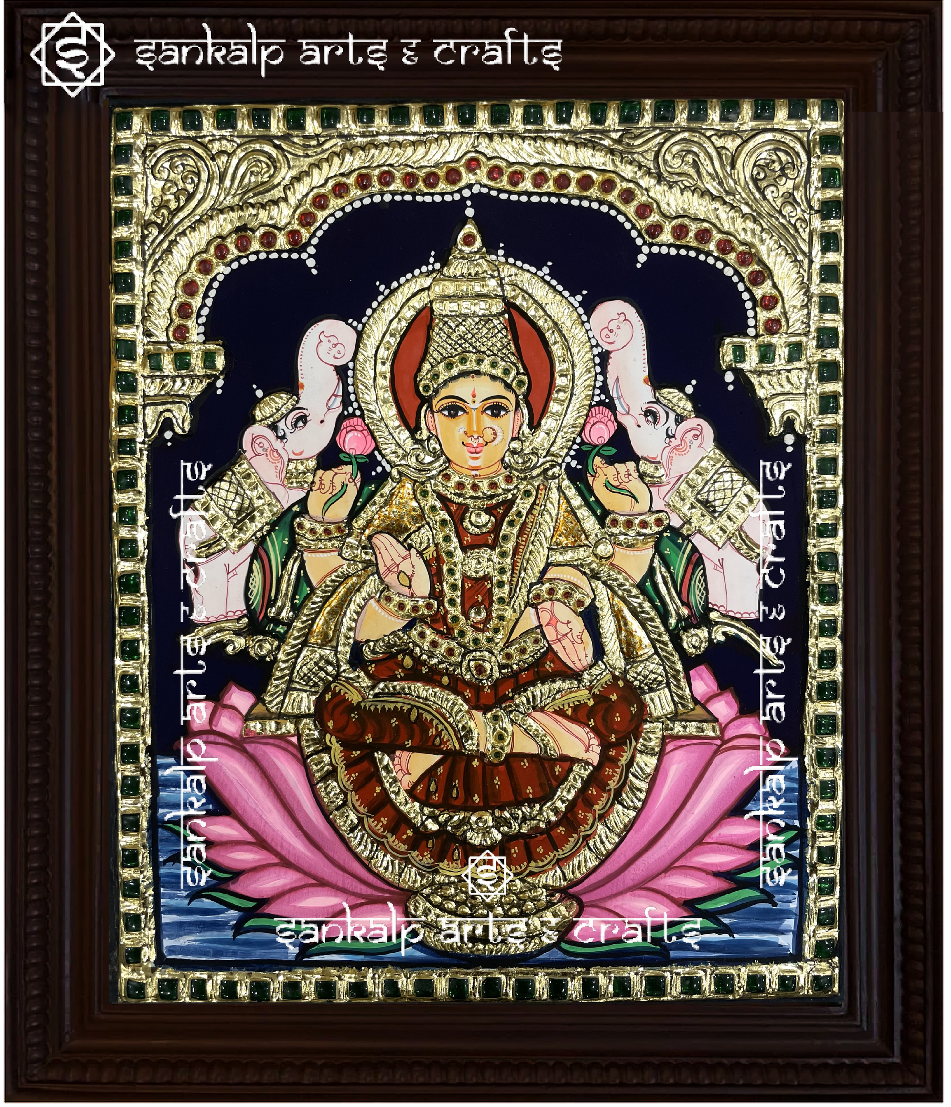 A beautifully handcrafted Gajalakshmi Tanjore painting depicting Goddess Lakshmi surrounded by two elephants, symbolizing wealth, prosperity, and abundance. The painting features intricate gold foil detailing and vibrant colors that bring divine blessings into your space.


