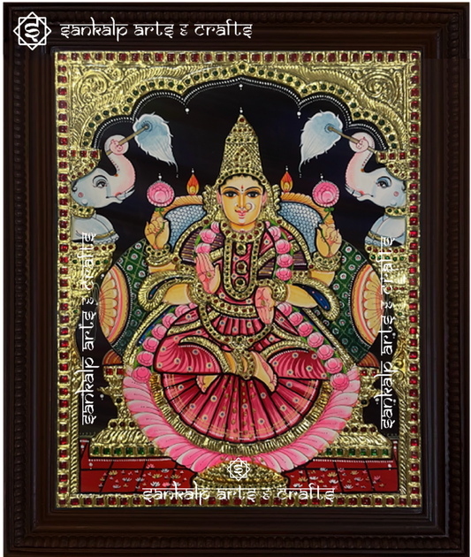 A divine Gajalakshmi Tanjore painting, featuring Goddess Lakshmi with elephants, crafted for auspicious decor in Chennai & Bangalore.

