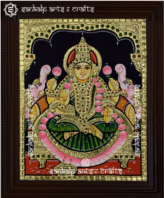 A divine Gajalakshmi Tanjore painting, showcasing Goddess Lakshmi with elephants, symbolizing prosperity and abundance. Handcrafted with gold foil, perfect for homes in Chennai & Bangalore.
