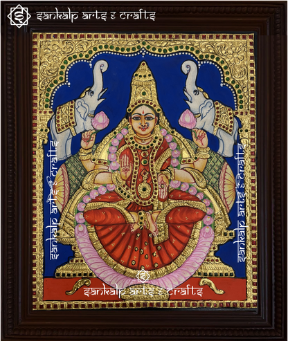 A stunning antique-style Tanjore painting of Goddess Gajalakshmi, adorned with intricate gold foil work, perfect for home decor in Chennai & Bangalore.

