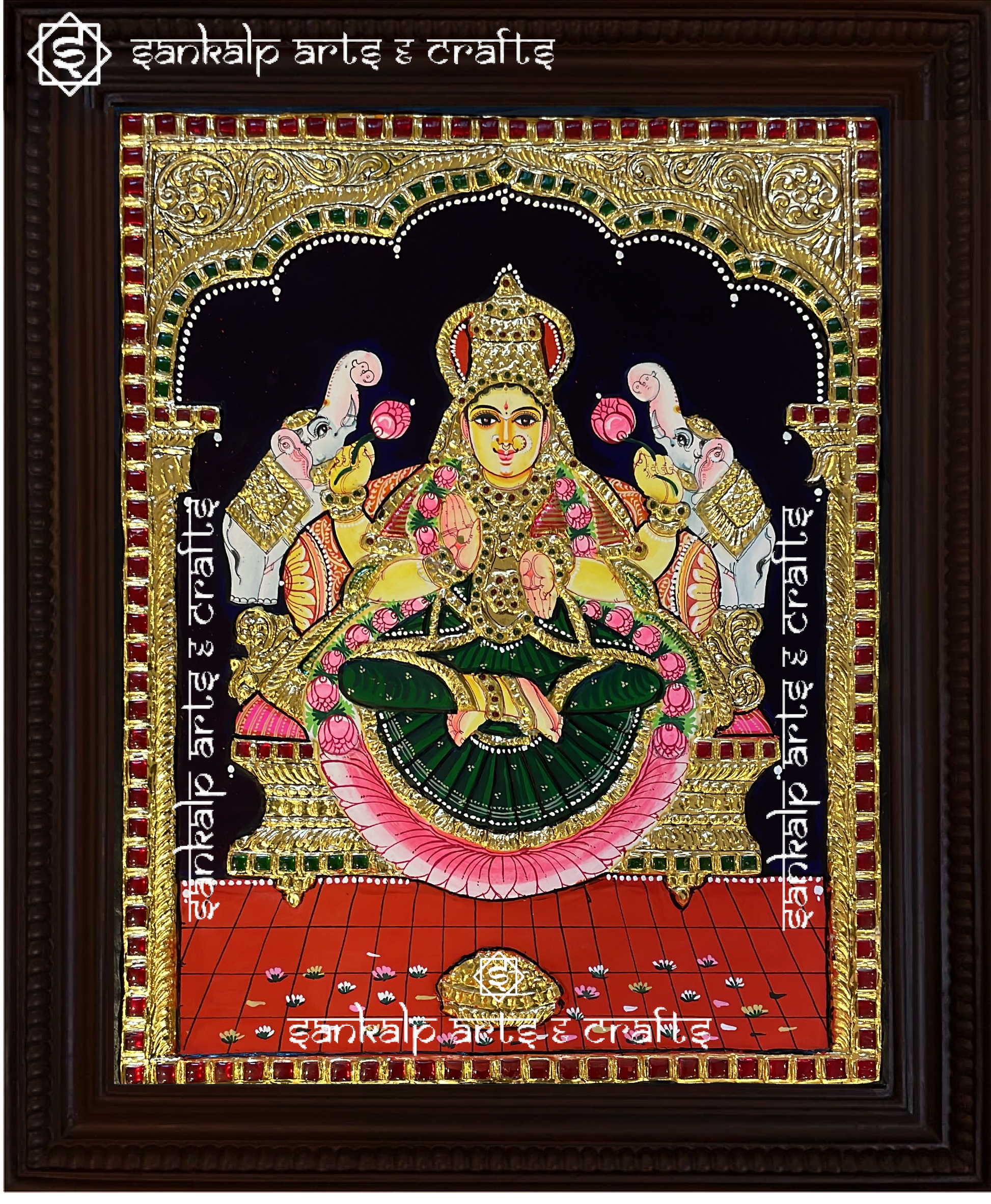 A stunning Tanjore painting of Goddess Gajalakshmi, seated with elephants showering blessings. A perfect spiritual decor piece for homes in Chennai & Bangalore.

