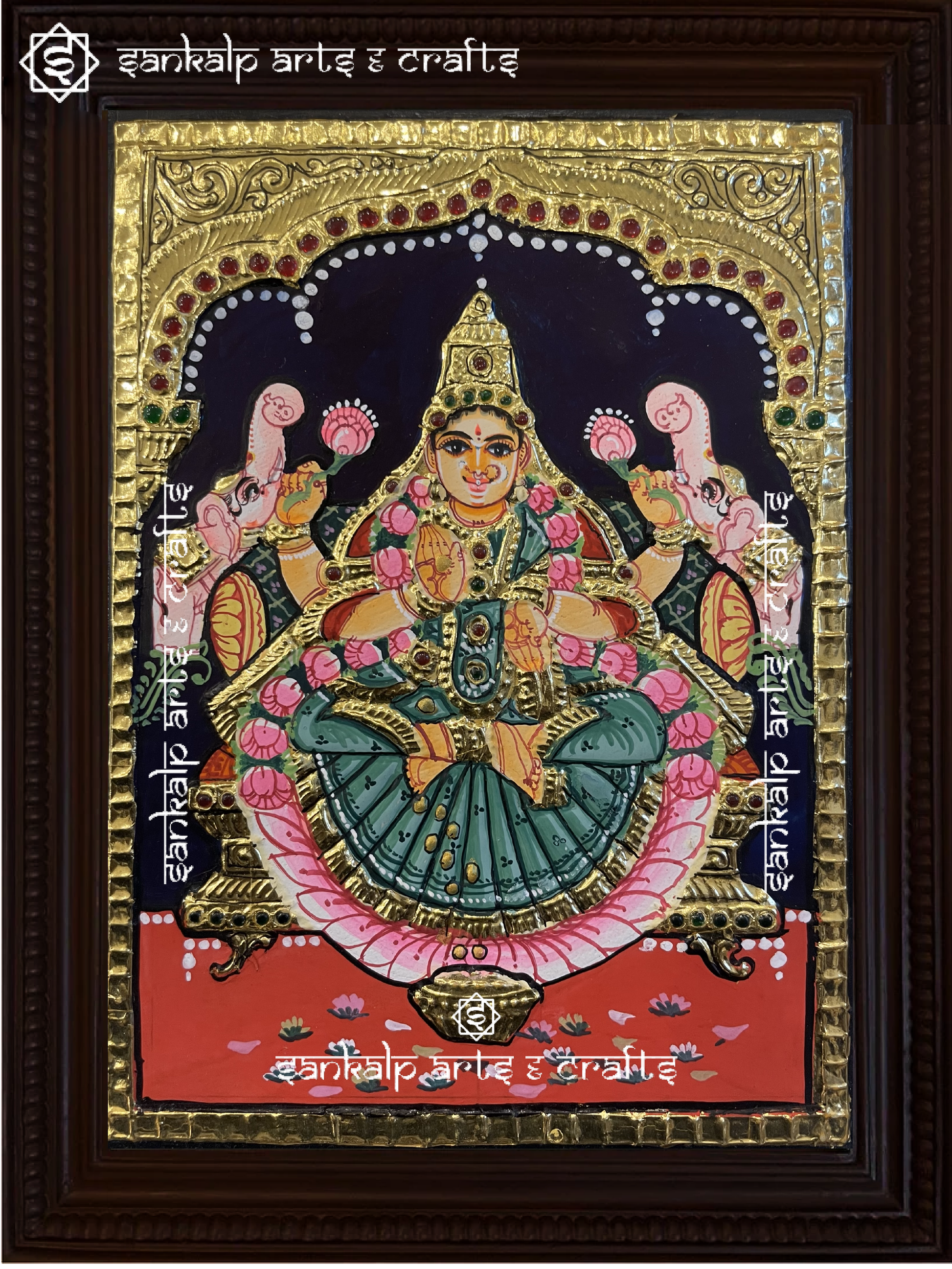 This handcrafted Tanjore painting of Goddess Gajalakshmi, symbolizing prosperity and abundance, is ideal for pooja rooms in Chennai & Bangalore.

