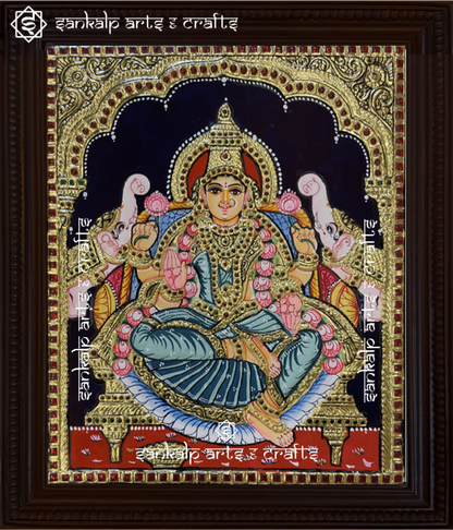 A divine antique-style Tanjore painting of Goddess Gajalakshmi, adorned with intricate gold foil work, perfect for home decor in Chennai & Bangalore.

