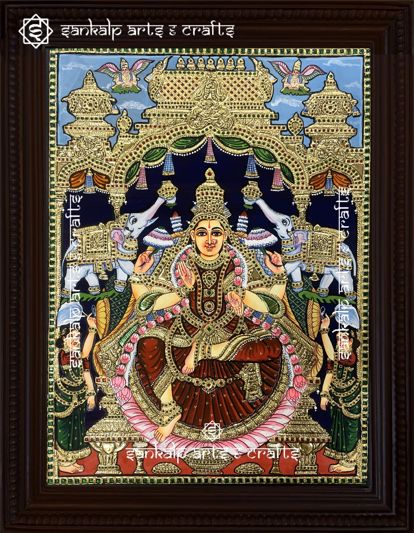 This Gajendra Lakshmi Tanjore painting radiates prosperity and grace, showcasing fine craftsmanship with vibrant colors and gold embellishments in Chennai & Bangalore.

