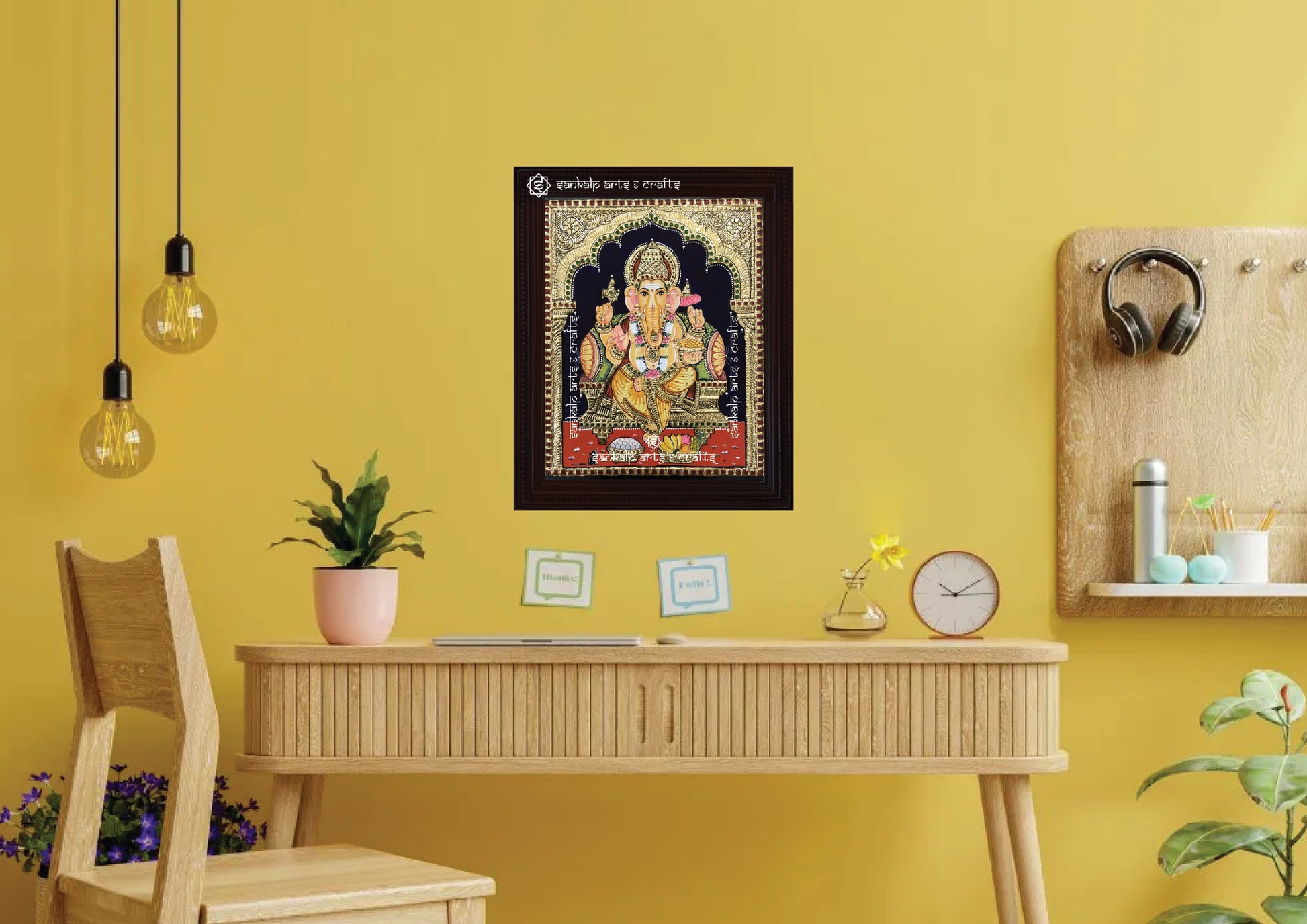 A framed Ganesha Tanjore painting, radiating divine energy with intricate gold work and vibrant colors, perfect for bringing prosperity, positivity, and blessings to your pooja room or living space.

