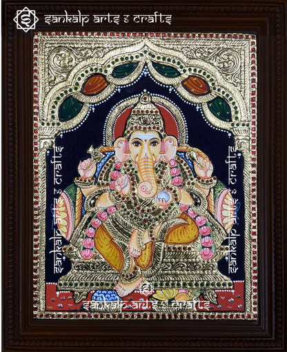 A beautifully handcrafted Ganesha Tanjore painting featuring Lord Ganapati seated gracefully, adorned with intricate gold foil detailing and vibrant colors, symbolizing wisdom, prosperity, and divine blessings.


