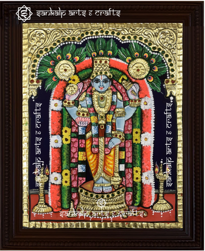 A beautifully handcrafted Guruvayoorappan Tanjore painting depicting Lord Krishna in his majestic form, holding a flute and adorned with intricate gold foil detailing. This artwork radiates divine blessings, prosperity, and devotion.

