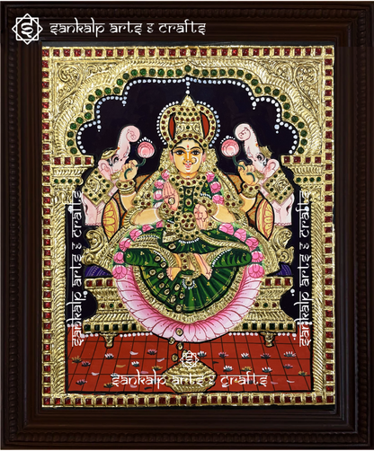 This exquisite Tanjore painting of Goddess Gajalakshmi showcases rich colors and intricate artistry. Perfect for homes and temples in Chennai & Bangalore.