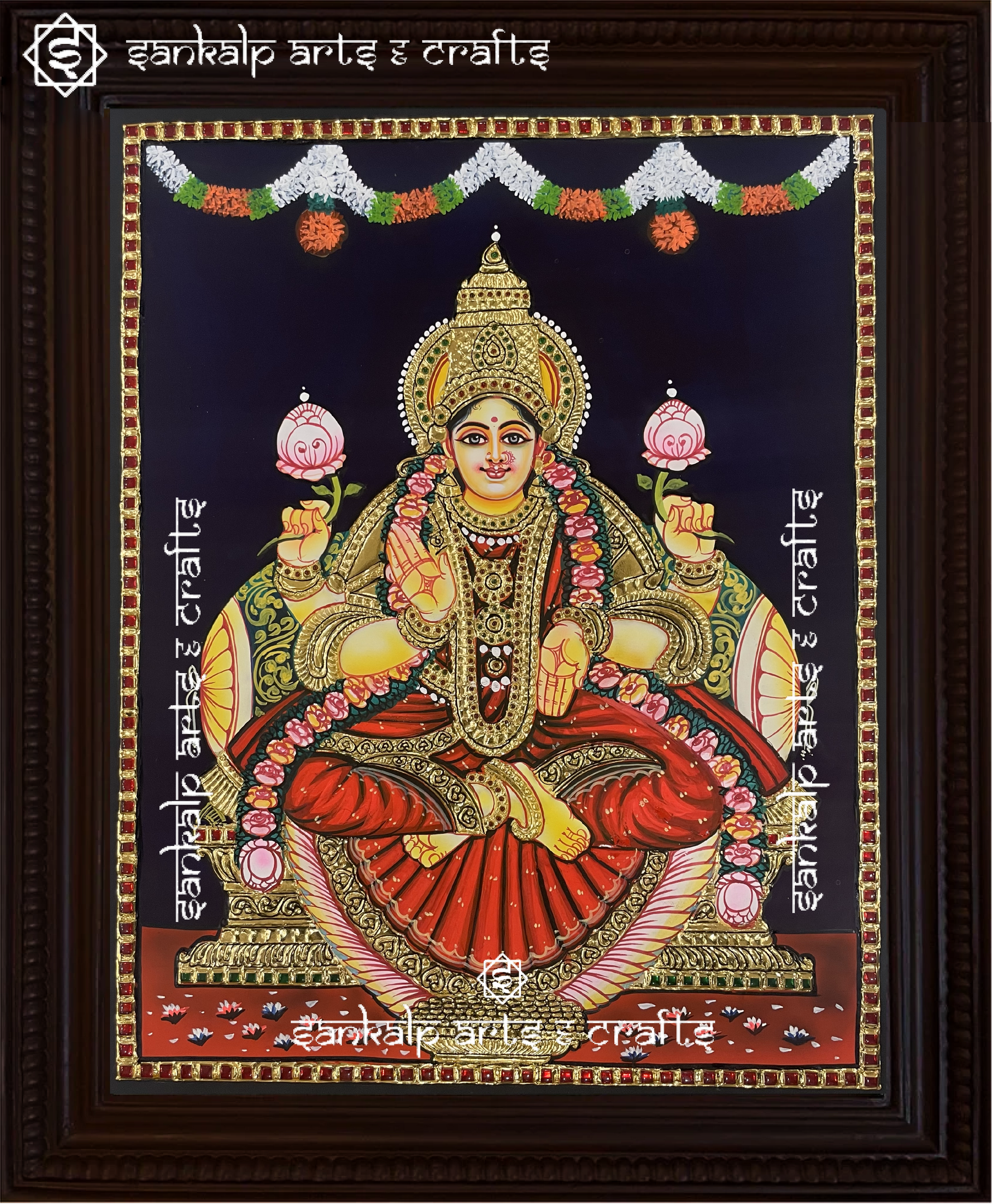 This exquisite Tanjore painting of Goddess Lakshmi, adorned with rich gold foil work, enhances the divine ambiance of pooja rooms in Chennai & Bangalore.

