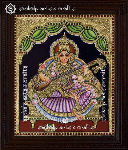 This traditional Tanjore painting of Goddess Saraswathi, adorned with gold foil detailing, enhances spiritual spaces in Chennai & Bangalore.

