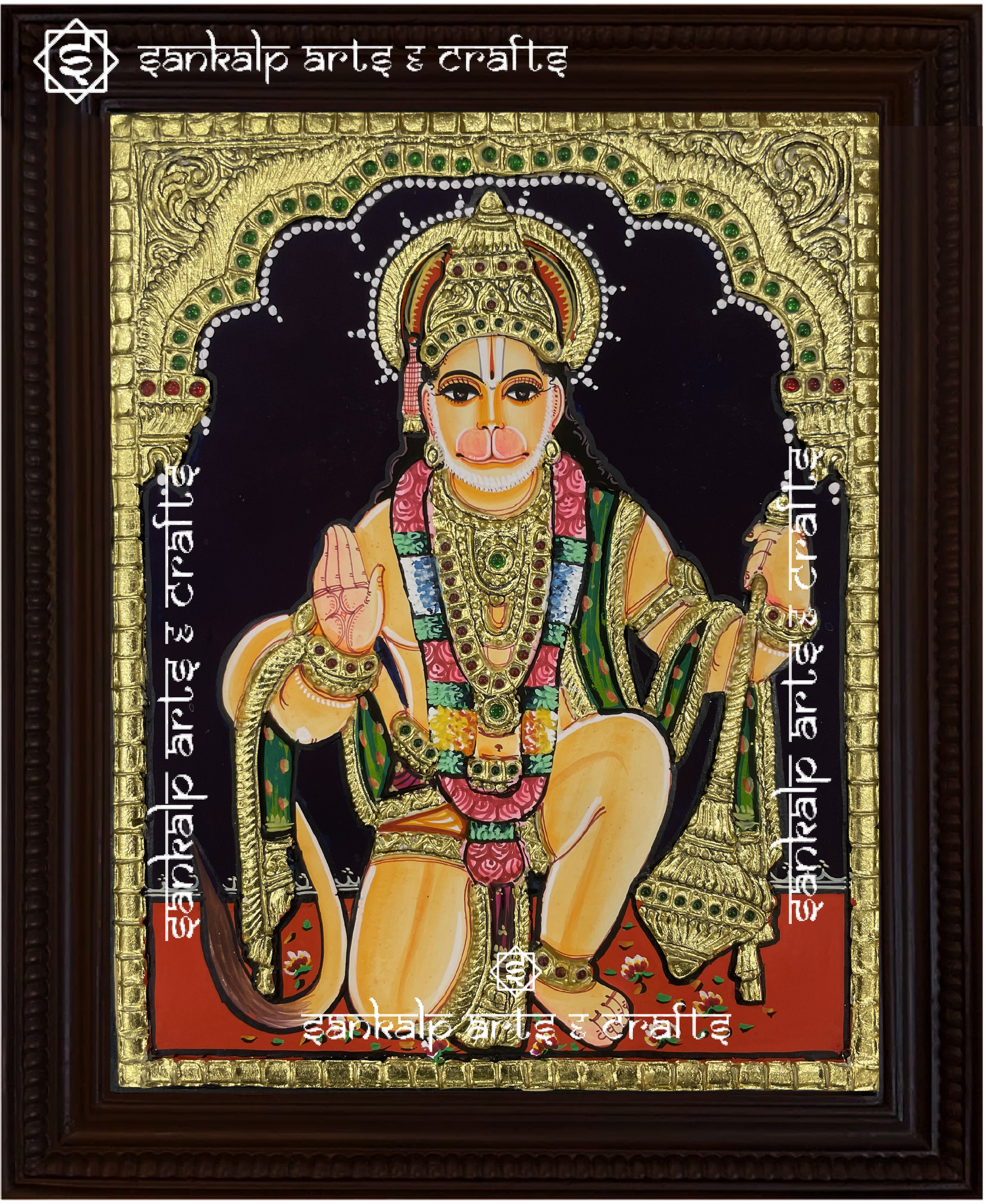 A close-up of the Hanuman Tanjore painting showcasing Lord Hanuman with rich gold embellishments and vivid hues, symbolizing his devotion, courage, and divine energy.

