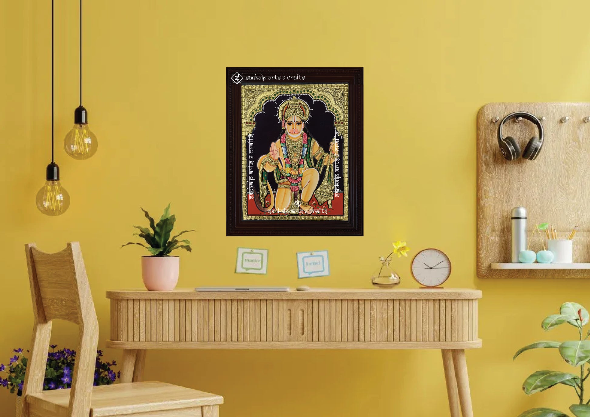 A framed Hanuman Tanjore painting, radiating divine energy with exquisite gold accents and intricate craftsmanship, perfect for bringing strength, devotion, and spiritual protection to your pooja room or living space.

