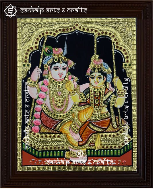 A divine Jhula Radha Krishna Tanjore painting in South Indian style, featuring intricate gold foil work and vibrant colors. Perfect for homes in Chennai & Bangalore.