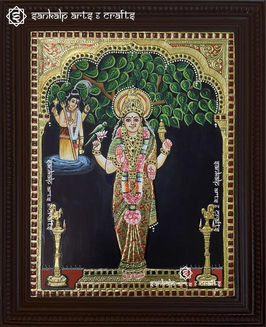A beautifully detailed Kanyaka Parameswari Tanjore painting, showcasing the goddess in vibrant colors with intricate gold foil work and traditional artistic elements.

