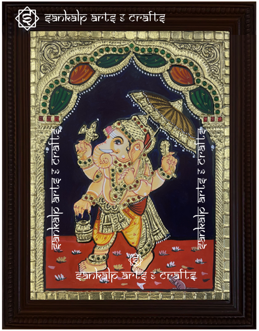 A beautifully handcrafted Kodai Vinayagar Tanjore painting, featuring Lord Ganesha with an umbrella, symbolizing protection, prosperity, and blessings. The intricate gold foil detailing and vibrant colors add a traditional and spiritual touch to this artwork.

