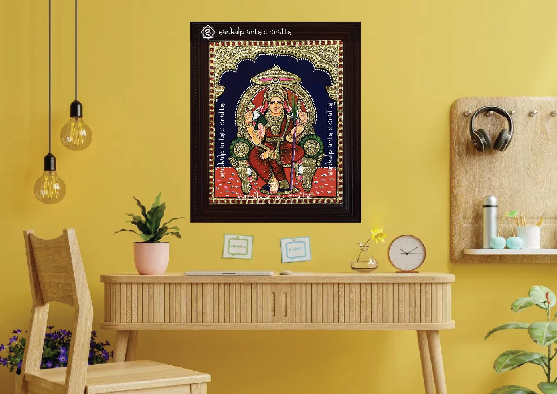 A framed Lalithambigai Tanjore painting in Chennai & Bangalore, featuring the goddess seated in divine glory, enriched with gold foil detailing and vibrant shades, an ideal addition to pooja rooms and spiritual spaces for positivity and devotion.

